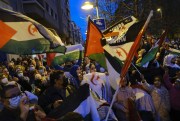 People wave Polisario Front flags while taking part in a demonstration in support of the Polisario Front and a free Western Sahara, Pamplona, Spain, March 23, 2022 (AP photo by Alvaro Barrientos).