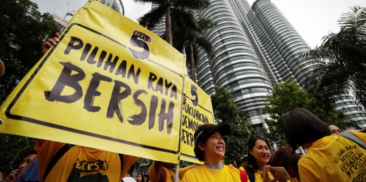 Activists from the Bersih movement in front of the Petronas Towers in Kuala Lumpur.