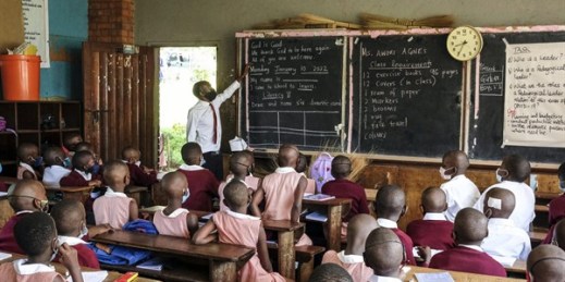 Pupils attend class at Kitante Primary School on the first day of classes after a 22-month pandemic closure, Kampala, Uganda, Jan. 10, 2022 (AP photo by Hajarah Nalwadda).