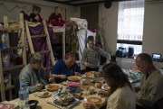 Displaced Ukrainian refugees have lunch cooked by volunteers, at a restaurant that was transformed into a shelter for those who are fleeing the war from eastern region of the country, in Dnipro, Ukraine, April 20, 2022 (AP photo by Leo Correa).