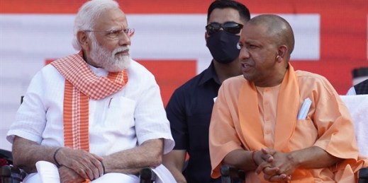 Indian Prime Minister Narendra Modi speaks with Yogi Adityanath during the latter’s swearing-in ceremony as chief minister of Uttar Pradesh state in Lucknow, India, March 25, 2022 (AP photo by Rajesh Kumar Singh).
