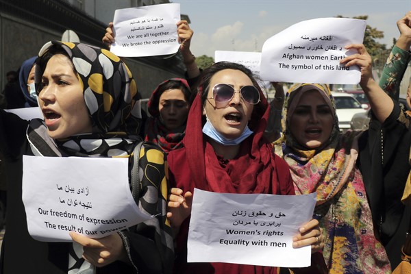 Women gather to demand their rights under the Taliban rule during a protest in Kabul, Afghanistan, Sept. 3, 2021 (AP photo by Wali Sabawoon).