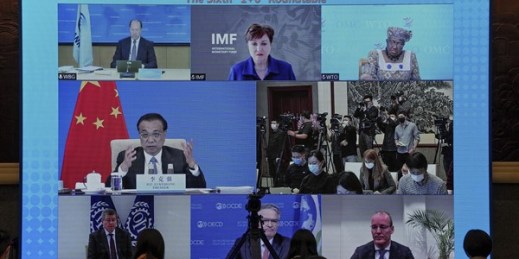Chinese Premier Li Keqiang speaks at a virtual “1+6” Round Table Dialogue with the heads of the World Bank, IMF, WTO, International Labor Organization, OECD and Financial Stability Board, in Beijing, Dec. 6, 2021 (AP photo by Andy Wong).