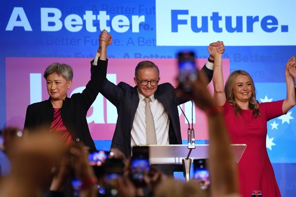 Labor Party leader Anthony Albanese celebrates with his partner, Jodie Haydon, right, and Sen. Penny Wong after winning Australia’s federal elections, Sydney, Australia, May 22, 2022 (AP photo by Rick Rycroft).