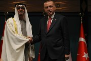 Turkish President Recep Tayyip Erdogan and Sheikh Mohammed bin Zayed Al Nahyan, the Crown Prince of the United Arab Emirates, shake hands after a signing ceremony at the presidential palace, in Ankara, Turkey, Nov. 24, 2021 (AP photo by Burhan Ozbilici).
