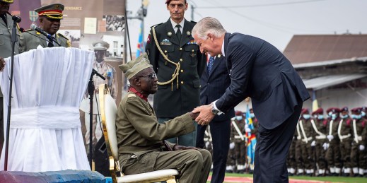 King Philippe of Belgium greets a Congolese veteran of WWII.