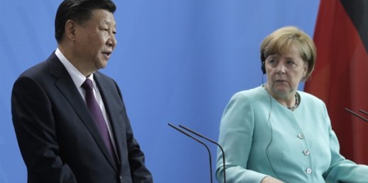 German Chancellor Angela Merkel, right, listens to Chinese President Xi Jinping during press statements at the chancellery in Berlin, Germany, July 5, 2017 (AP photo by Markus Schreiber).