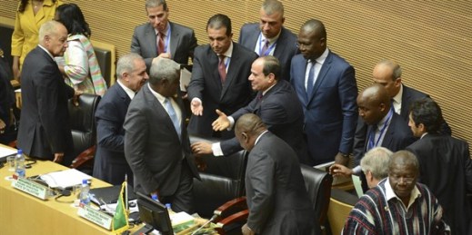 Egyptian President Abdel Fattah el-Sisi is greeted at the opening session of the 33rd AU Summit, where he handed over chairmanship of the bloc to South African President Cyril Ramaphosa, in Addis Ababa, Ethiopia, Feb. 9, 2020 (AP photo).