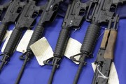 Seized firearms that were destined for the Los Zetas drug trafficking organization in Mexico are seen at a news conference, Feb. 8, 2012, in San Antonio. (AP photo by Eric Gay).