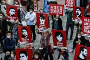 Protesters chant slogans and hold placards during a protest in Istanbul, June 1, 2020.