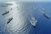 The U.K. carrier strike group conducts operations alongside Japan Maritime Self-Defense Forces