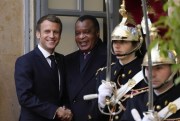 French President Emmanuel Macron greets Republic of Congo President Denis Sassou Nguesso in Paris, Nov. 12, 2021 (AP photo by Francois Mori).