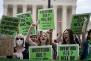 Abortion-rights supporters protest following the Supreme Court decision to overturn Roe v. Wade in Washington, June 24, 2022 (AP photo by Gemunu Amarasinghe).