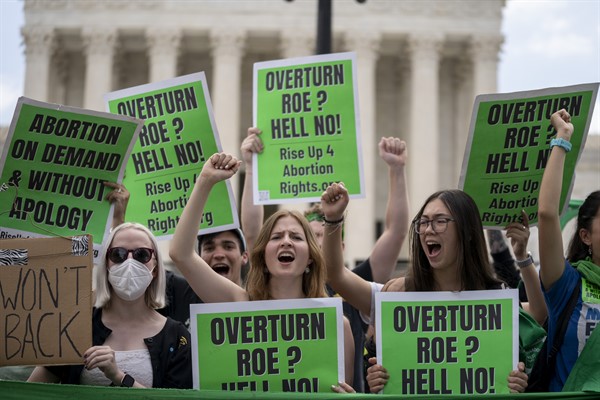 Abortion-rights supporters protest following the Supreme Court decision to overturn Roe v. Wade in Washington, June 24, 2022 (AP photo by Gemunu Amarasinghe).