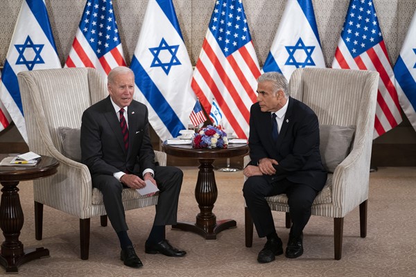 U.S. President Joe Biden and Israeli Prime Minister Yair Lapid address the media following their meeting in Jerusalem, July 14, 2022 (AP photo by Evan Vucci).