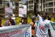Environmental and wildlife campaigners march to the Chinese embassy to protest the proposed construction of a Chinese-built railway bridge, in Nairobi, Kenya, Oct. 17, 2016 (AP Photo by Ben Curtis).