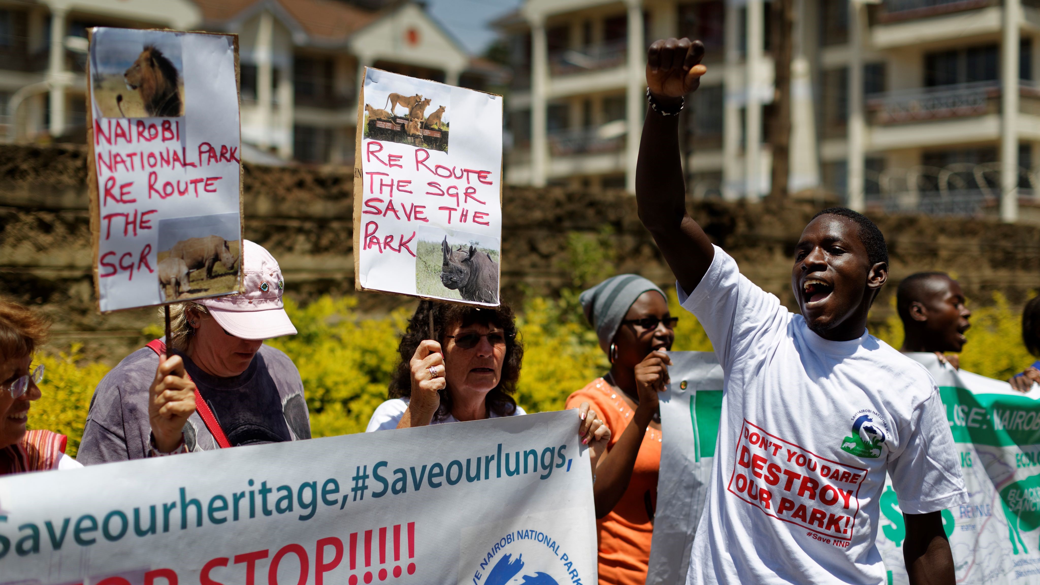 Environmental and wildlife campaigners march to the Chinese embassy to protest the proposed construction of a Chinese-built railway bridge, in Nairobi, Kenya, Oct. 17, 2016.
