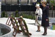 Queen Elizabeth II and then-Irish President Mary McAleese after laying a wreath in Dublin, Ireland in May 2011.