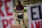 A woman protests against bullfighting, Spain.