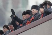 Then-Soviet President Mikhail Gorbachev waves during the military parade marking the 71st anniversary of the Bolshevik revolution in Moscow in 1988.