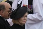 British Prime Minister Liz Truss waits for the arrival of the coffin of Queen Elizabeth II, at the Royal Air Force Northolt, London.