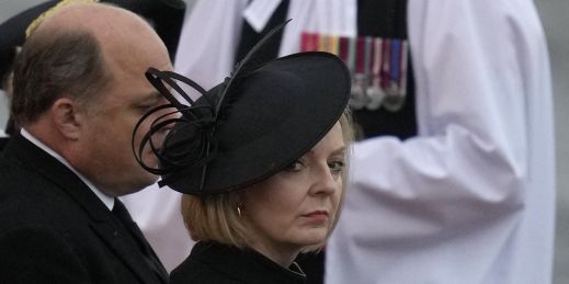 British Prime Minister Liz Truss waits for the arrival of the coffin of Queen Elizabeth II, at the Royal Air Force Northolt, London.