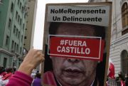 A protestor in Peru protests Pedro Castillo
