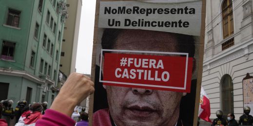 A protestor in Peru protests Pedro Castillo