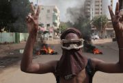 An anti-coup protester in Sudan.