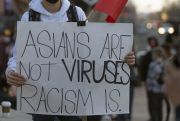 A demonstrator participates at a rally to raise awareness of anti-Asian violence and anti-China rhetoric in Los Angeles.