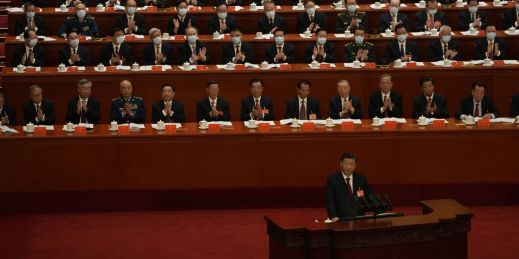 CCP Delegates applaud as China's President Xi Jinping