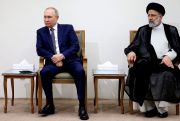 Russia's president with Iran's president discussing Iran-Russia relations