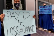 Activists at COP27 2022 calling on Europe to do more for climate change justice