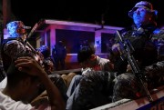 In El Salvador, people are detained and taken to prison amid a state of emergency in an effort to mitigate gang violence