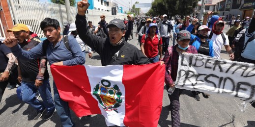 Supporters of ousted Peruvian President Pedro Castillo protest his detention.