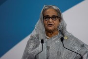 Bangladesh's prime minister, Sheikh Hasina, has been stifling democracy and protests in a political crisis.