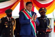 President Santokhi of Suriname faces an economic and political crisis caused by inflation and IMF-backed austerity measures.
