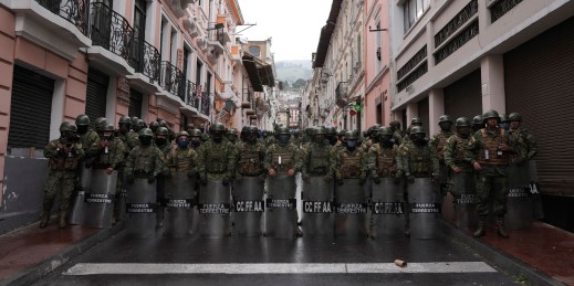 Security forces block protesters from marching to the presidential palace in Quito, Ecuador.