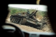 A destroyed tank is seen by the side of the road in western Tigray.