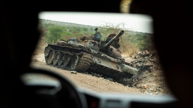 A destroyed tank is seen by the side of the road in western Tigray.