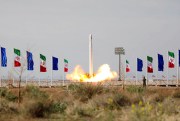 An Iranian rocket carrying a satellite is launched from an undisclosed site.
