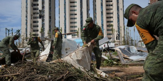 Soldiers gather debris in the aftermath of Hurricane Otis, in Acapulco, Mexico.