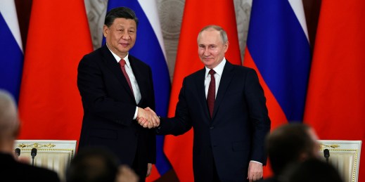 Russian President Vladimir Putin and Chinese President Xi Jinping shake hands after speaking to the media during a signing ceremony following their talks at The Grand Kremlin Palace, in Moscow, Russia, March 21, 2023.