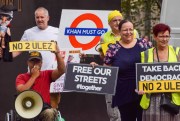 People protest London’s Ultra-Low Emission Zones.