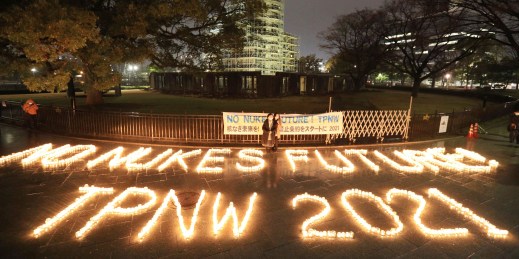 Lighted candles spell out, “No Nukes Future! TPNW 2021."