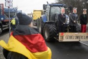 Farmers protest against Germany's ruling coalition.