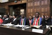 South African officials attend the opening of hearings at the International Court of Justice.
