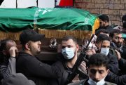 Hamas members carry the coffin of Saleh Arouri.