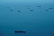 Cargo ships wait in Panama Bay.