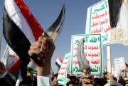 Houthi supporters protest against U.S.-led airstrikes.